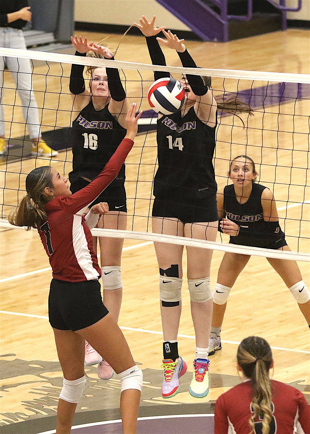 Polson's McKenna Corley and Eliza Todd block Browning during last week's win. (Bob Gunderson photo)