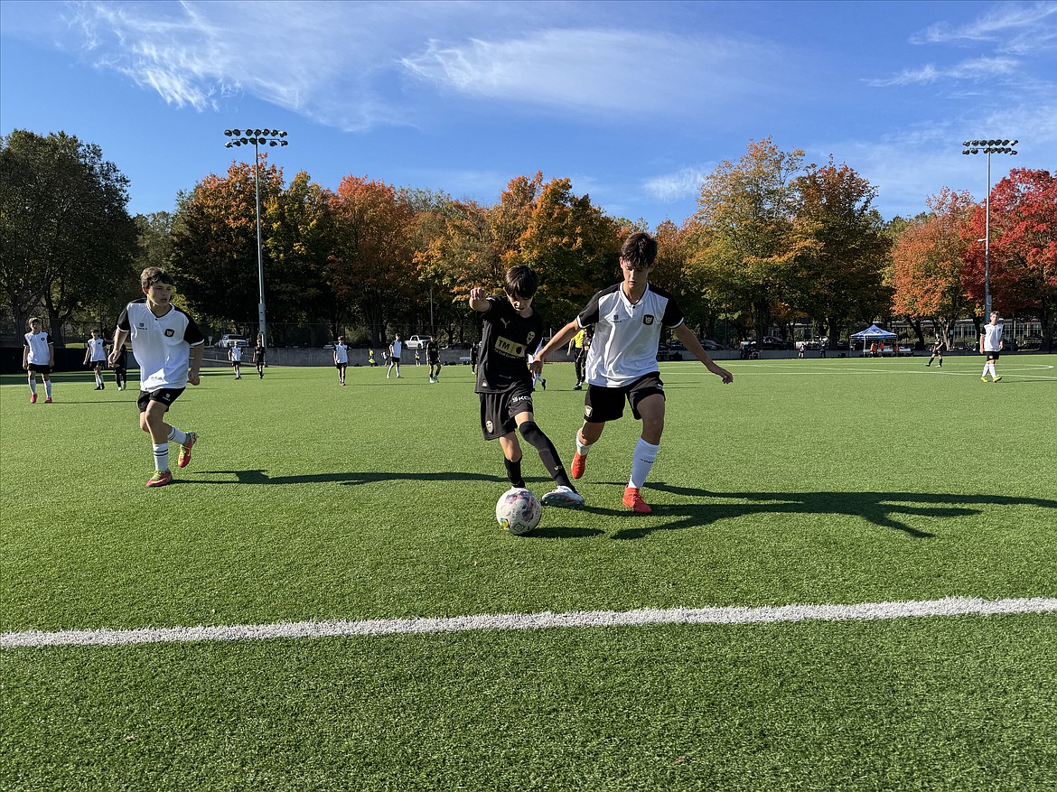 Courtesy photo
The Sting 2011 boys Academy soccer team traveled to Seattle this past weekend for two EA league games. Pictured is Jay Blue, right, going after the ball.