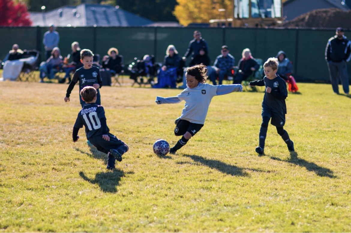 Photo by RUSTAM ABDURAHMANOV
On Saturday morning, the Sting Soccer Club 2016 boys Black soccer team defeated 90+ Project 2016 Boys Jaramillo 7-1 at Hayden Meadows Elementary. Sting Black goals were scored by Jackson Martin (8), Leo Leferink (5), Oliver Lundy (19), Eli Hocking (15), and Jaden Abdurahmanov (23). Pictured is Eli Hocking (15) taking a shot at goal.