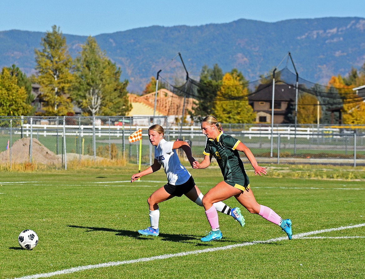 Whitefish striker Delaney Smith beats a defender to the ball at the Oct. 10 game against Thompson Falls. (Julie Engler/Whitefish Pilot)