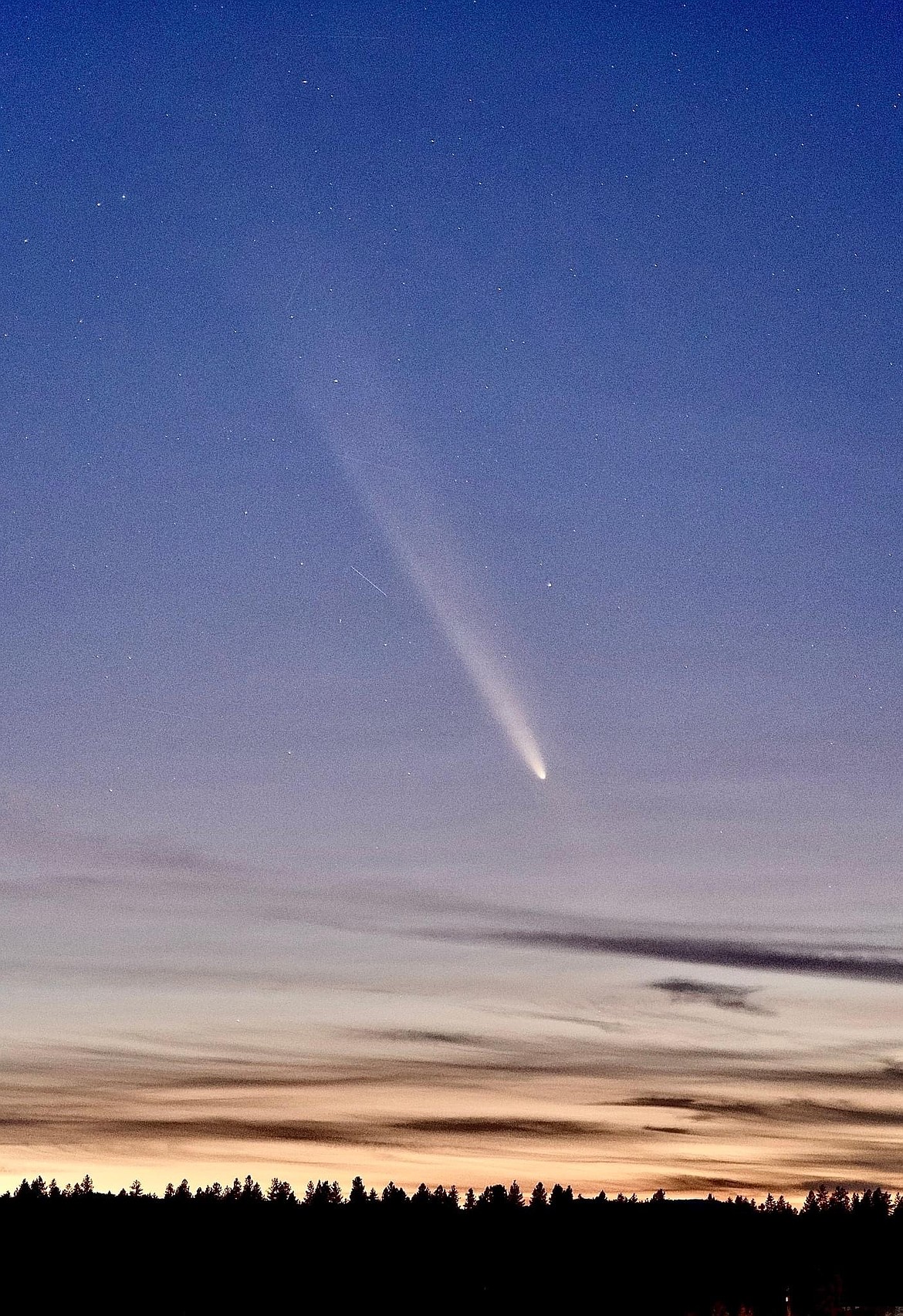 The U.S. National Weather Service’s Spokane office posted a view of Comet C/2023 A3 Tsuchinshan-Atlas on Sunday evening. The elevated smoke and cirrus clouds made the comet appear brighter.