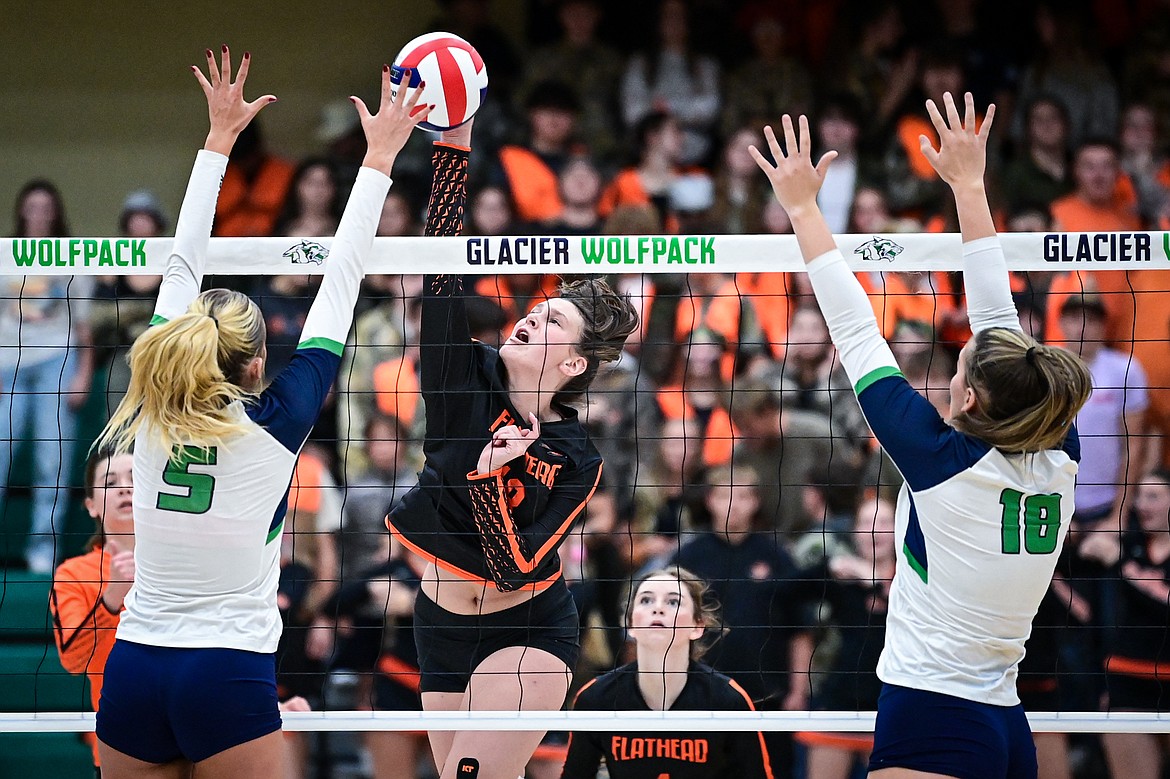 Flathead's Emma Eve (18) goes to the net for a kill against Glacier at Glacier High School on Tuesday, Oct. 15. (Casey Kreider/Daily Inter Lake)