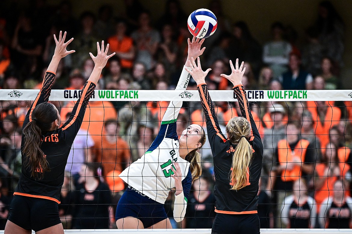 Glacier's Grace Lingle (13) goes to the net for a kill against Flathead at Glacier High School on Tuesday, Oct. 15. (Casey Kreider/Daily Inter Lake)