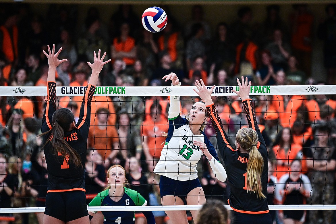 Glacier's Grace Lingle (13) goes to the net for a kill against Flathead at Glacier High School on Tuesday, Oct. 15. (Casey Kreider/Daily Inter Lake)