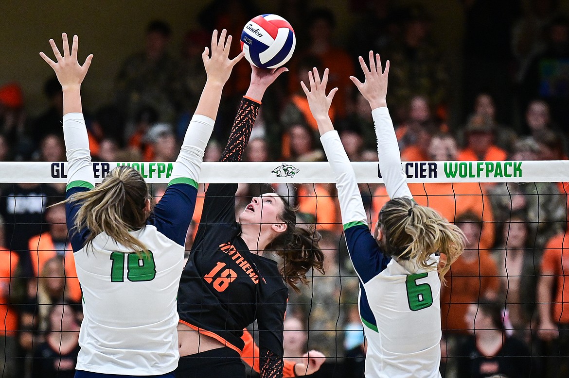 Flathead's Emma Eve (18) goes to the net for a kill against Glacier at Glacier High School on Tuesday, Oct. 15. (Casey Kreider/Daily Inter Lake)