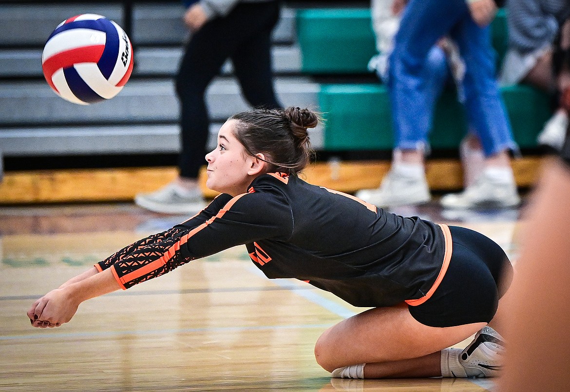 Flathead's Tailyr Reece (1) goes to the floor for a dig against Glacier at Glacier High School on Tuesday, Oct. 15. (Casey Kreider/Daily Inter Lake)