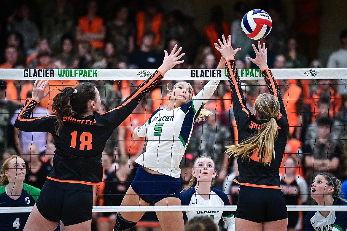 Glacier's Mali Carroll (5) goes to the net for a kill against Flathead at Glacier High School on Tuesday, Oct. 15. (Casey Kreider/Daily Inter Lake)