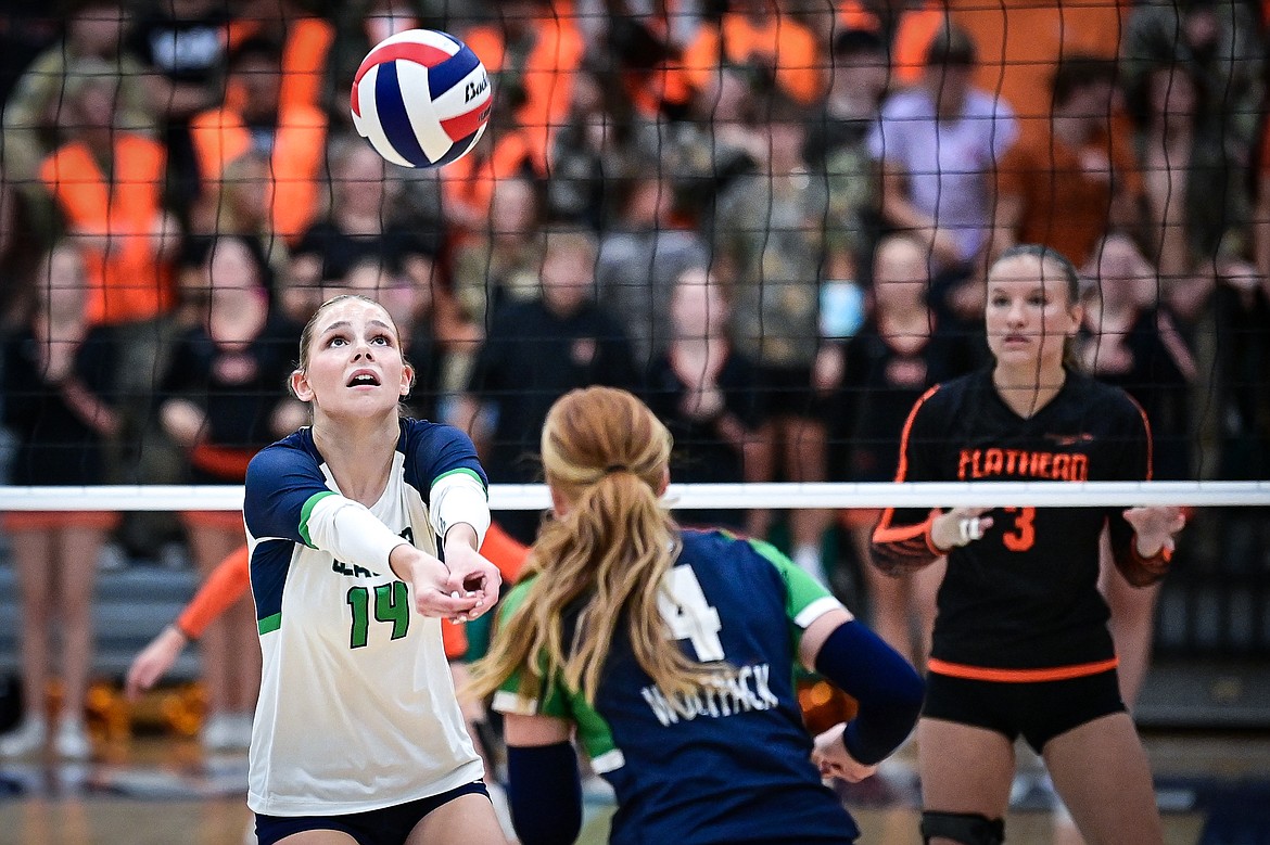 Glacier's Stella Bayard (14) passes to a teammate against Flathead at Glacier High School on Tuesday, Oct. 15. (Casey Kreider/Daily Inter Lake)