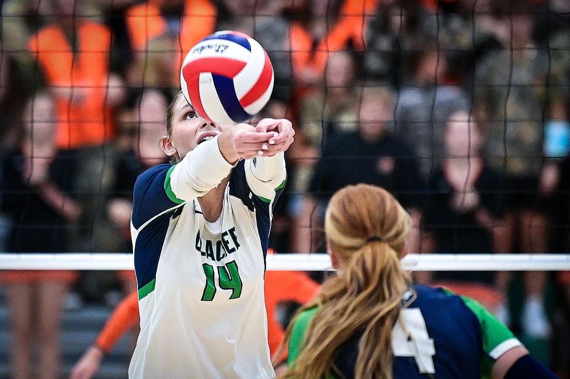 Glacier's Stella Bayard (14) passes to a teammate against Flathead at Glacier High School on Tuesday, Oct. 15. (Casey Kreider/Daily Inter Lake)