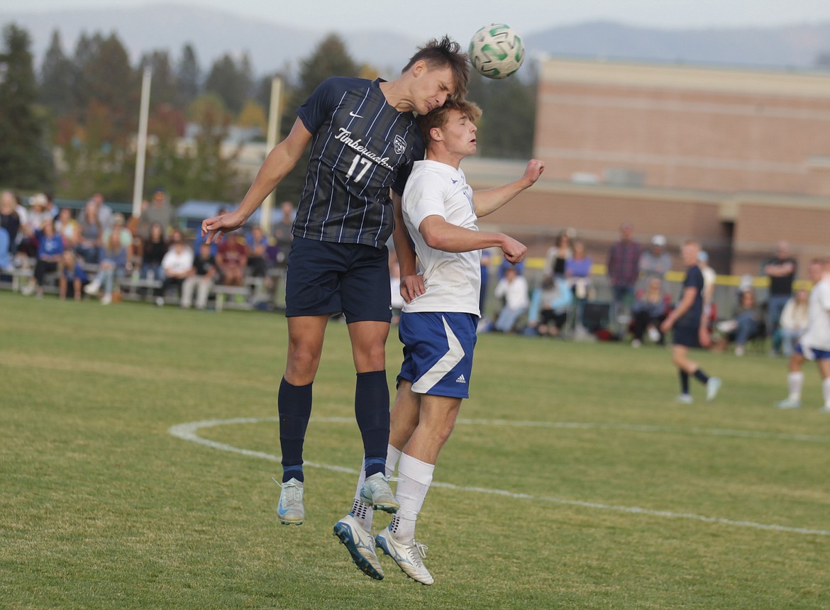 JASON ELLIOTT/Press
Lake City junior left wing Jonathan Kitsak and Coeur d'Alene senior midfielder Liam Martin battle for the ball during the second half of Game 2 in the 6A District 1 boys soccer championship series. Lake City defeated Coeur d'Alene 2-1 in overtime to advance to the state tournament starting next Thursday at Coeur d'Alene High.