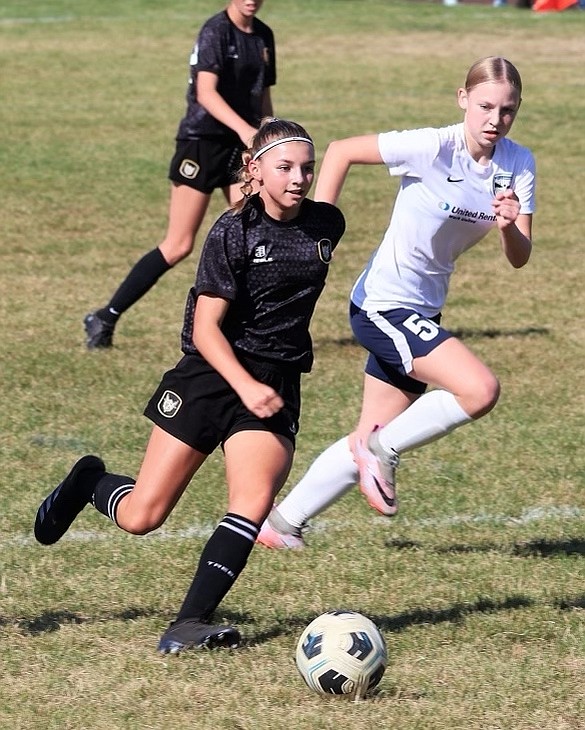 Photo by KAYLEAN MAY
The Sting SC 2013 girls Academy soccer team defeated Hells Canyon G2012 Strehle 5-3 in Lewiston last weekend. The Sting remain undefeated this season in their league. Pictured at center is Addison Salas of the Sting.