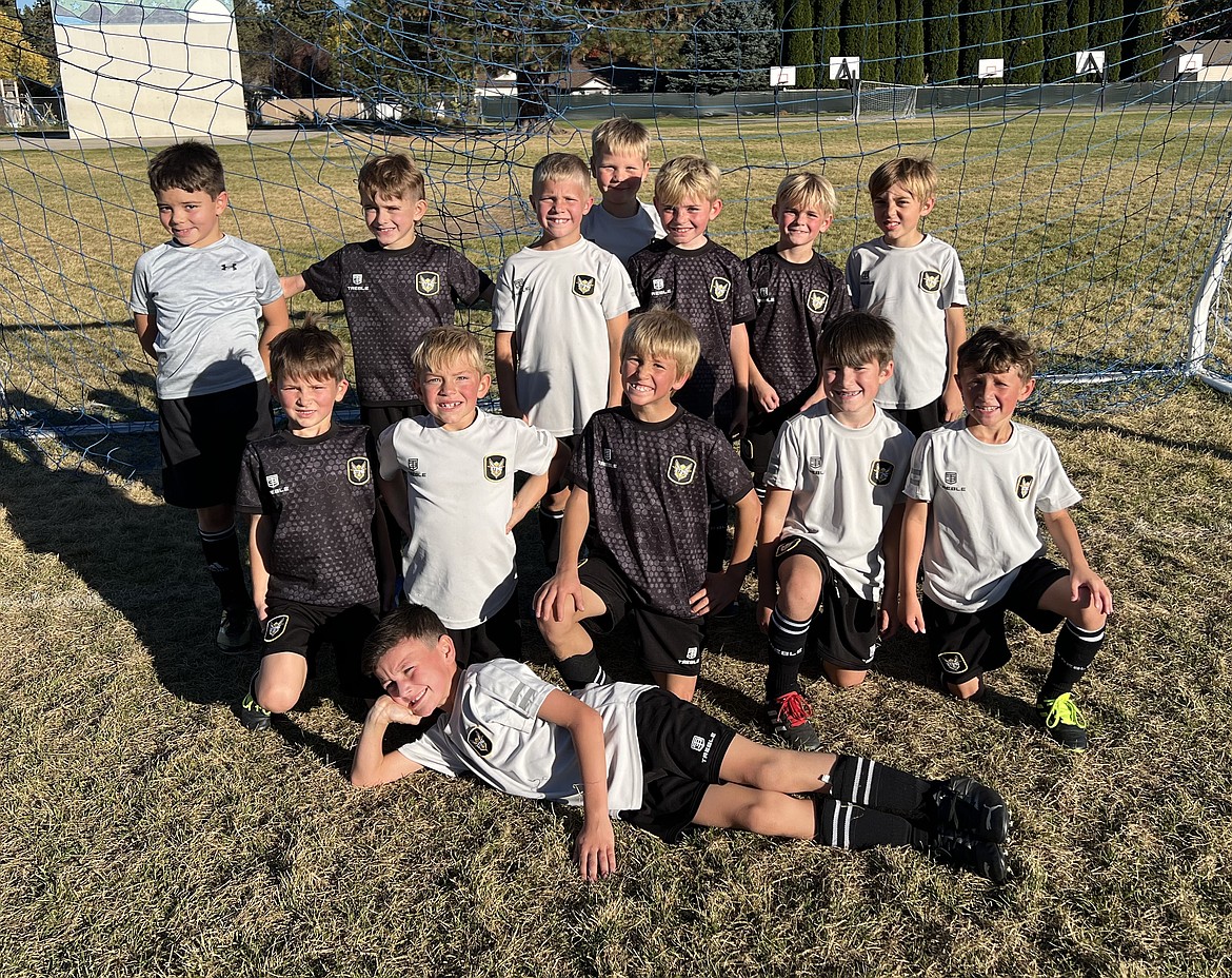 Photo by KATHY STERLING
The Sting U9 boys Yellow soccer team lost 7-6 to the WE Surf SC B16 Griffith team on Sept. 28 at Plante's Ferry Sports Complex in Spokane Valley. Sting goals were scored by Atlas Lepley, Elijah Cline and Xavier Sousley. On Oct. 12 the Sting Yellow played an interclub match against the Sting U9 Black team at Hayden Meadows Elementary, with the Black team winning 4-2. Goals were scored for the Black team by Emmett Cowan and Hudson Helbling. Goals were scored for the Yellow team by Atlas Lepley. On Oct. 13 the Sting Yellow team beat the Sandpoint FC 2016B Black team 2-0 at Centennial Field in Sandpoint. Goals were scored by Xavier Sousley and Gideon Lee. In the front is Xavier Sousley; second row from left, Emmett Cowan, Elijah Cline, Gideon Lee, Lincoln Sargent and Xander Rodriguez; and back row from left, Thomas Ely, Oliver Lundy, Atlas Lepley, Isaak Sterling, Wesson Malmstadt,  Hudson Hebling and Micah D’Alessandro.