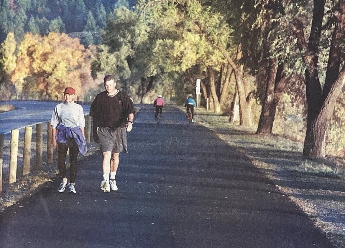 In 1999, Doug and Pam Potter walk along the North Idaho Centennial Trail after it was recognized as a Millennium Legacy Trail.