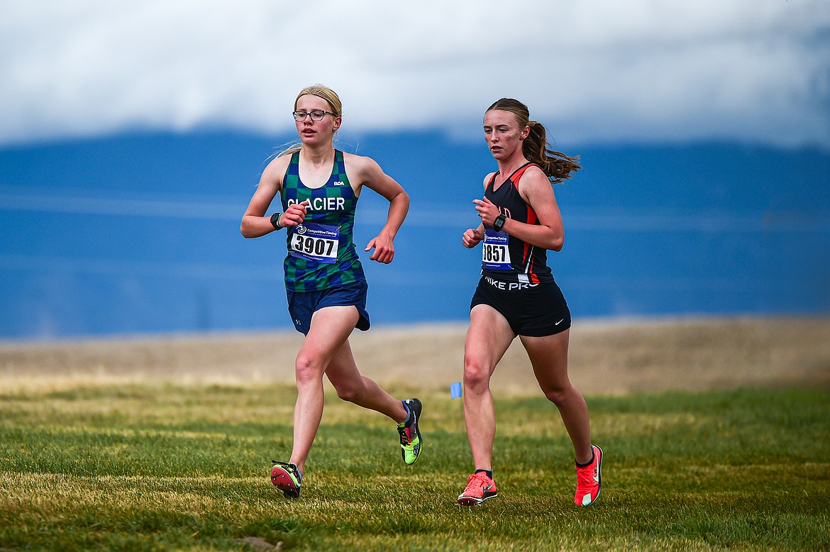 Glacier's Lauren Bissen and Flathead's Josie Wilson took first and second place at the Glacier Invite at Rebecca Farm on Wednesday, Oct. 16. (Casey Kreider/Daily Inter Lake)