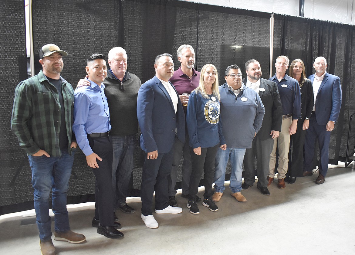 The board of directors,both incoming and returning, of the Moses Lake Chamber of Commerce is introduced at the chamber’s annual meeting Tuesday. From left: AJ Ascamilla, Platt Electric; Manuel Lopez, Michael’s On The Lake;  Don Kersey, Group14; Roger Silva, Raybern Group; Alan Heroux, Realty Executives;  Jeanette Ferguson, Danco Excavation; Jason Avila, Renew; Steven Brooks, Samaritan Healthcare; Dan Roach, Port of Moses Lake; Melissa Klitzke, Washington Trust Bank; and Kieth Siebert, Grant PUD. Not pictured: Rafelita Tijerina, Big Bend Community College; Brant Mayo, Grant County EDC; Darla Meise, NW AG.