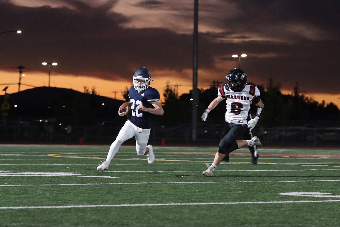 Almira/Coulee-Hartline junior Harvest Parrish (6) pursues a Liberty Christian ballcarrier during a Sept. 20 game in Kennewick. Since falling to the Patriots, the Warriors are in the midst of a three-game win streak.