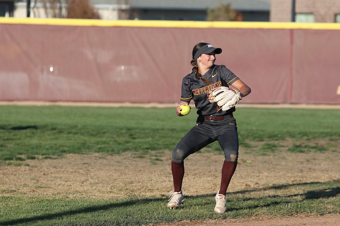 Maverick junior Hayden Morris looks toward first base after picking up a ground ball on Oct. 8. Morris drove in four runs in the second game of a doubleheader against Eastmont on Thursday.