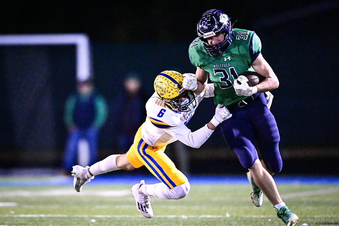 Glacier tight end Mark Ahner (31) picks up yardage after a reception in the first quarter against Missoula Big Sky at Legends Stadium on Thursday, Oct. 17. (Casey Kreider/Daily Inter Lake)