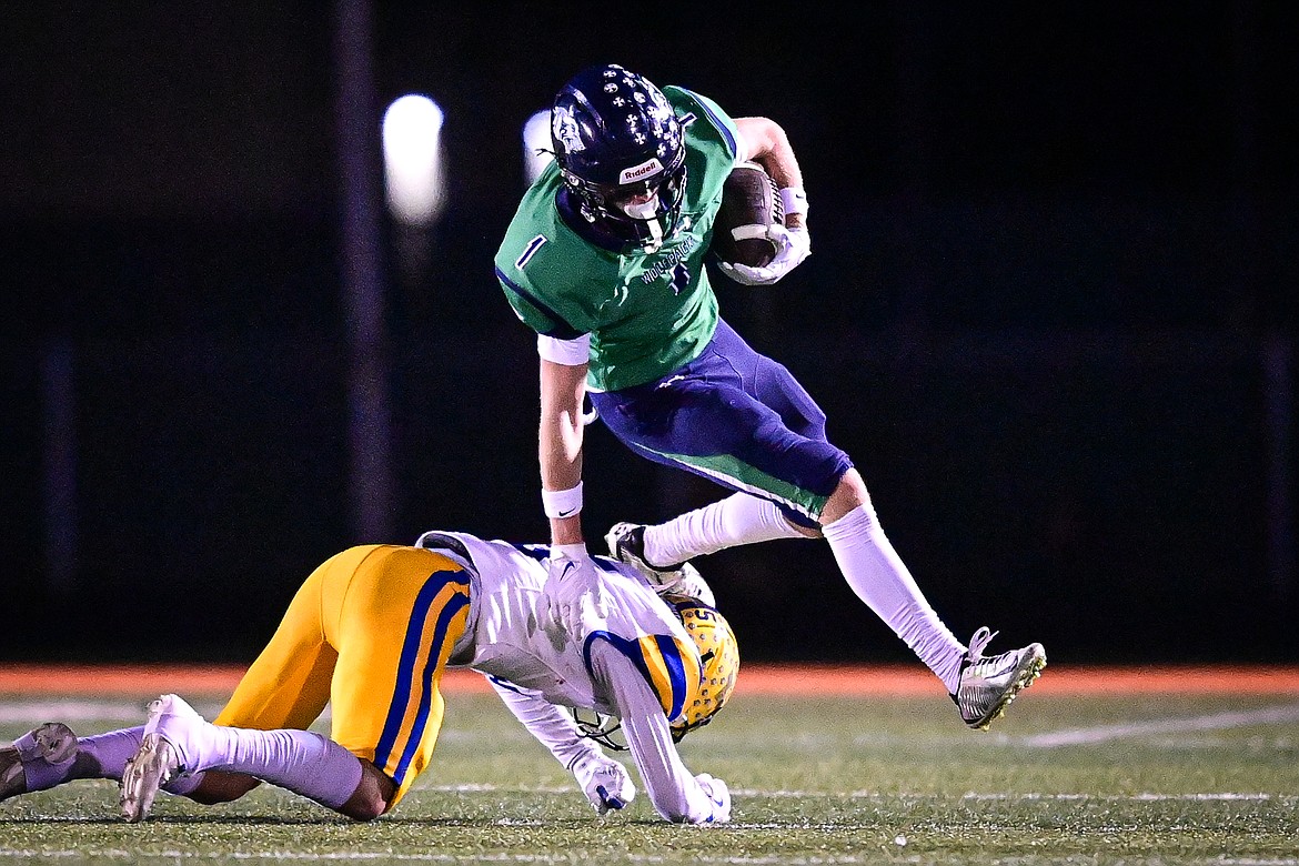 Glacier wide receiver Bridger Smith (1) picks up yardage after a reception in the second quarter against Missoula Big Sky at Legends Stadium on Thursday, Oct. 17. (Casey Kreider/Daily Inter Lake)