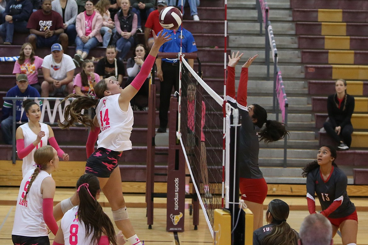 Moses Lake junior Kardyn Martinez tips the ball over the net during a match against Sunnyside on Oct. 10. The Mavericks are 6-4 overall this season, sitting fourth in the Big 9.