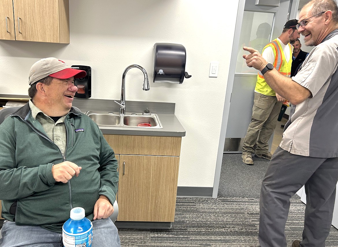 Bob Drapeau with the city of Coeur d'Alene shares a laugh with Jay Leake.