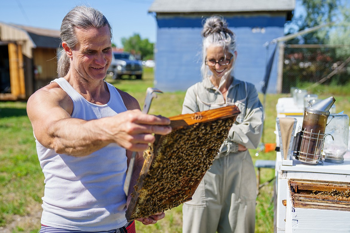 Beekeeping instructor Scott Debnam provides instruction at the UM Apiary in Missoula. (UM Photos by Coral Scoles-Coburn)