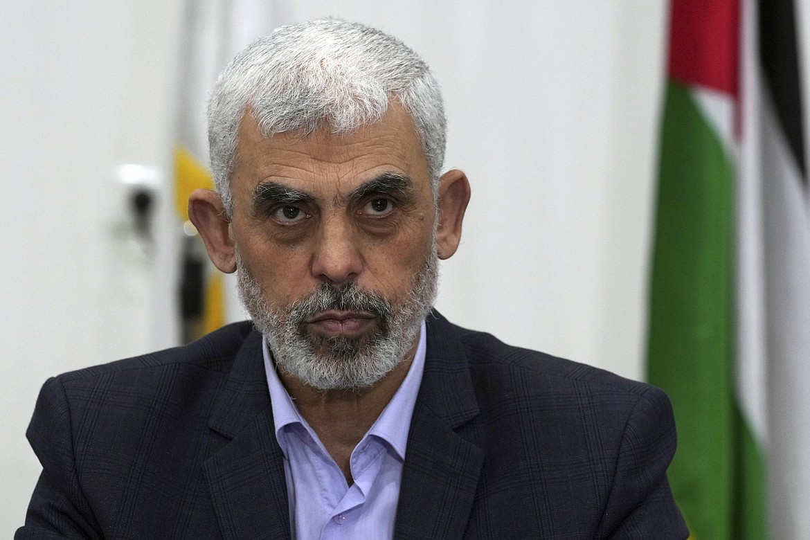 Yahya Sinwar, head of Hamas in Gaza, chairs a meeting with leaders of Palestinian factions at his office in Gaza City, on April 13, 2022. (AP Photo/Adel Hana, File)