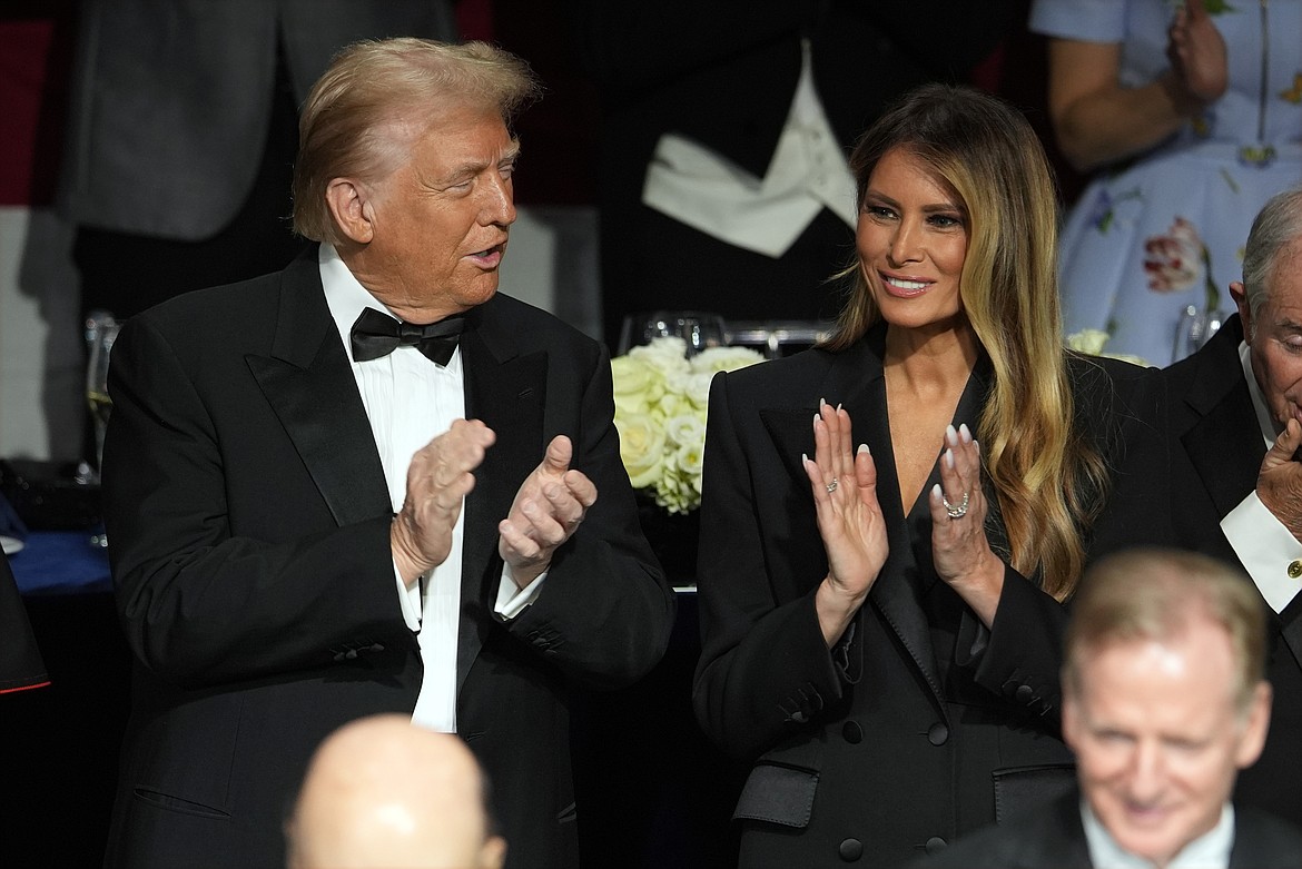 Republican presidential nominee former President Donald Trump and former first lady Melania Trump arrive for the 79th annual Alfred E. Smith Memorial Foundation Dinner, Thursday, Oct. 17, 2024, in New York. (AP Photo/Julia Demaree Nikhinson)