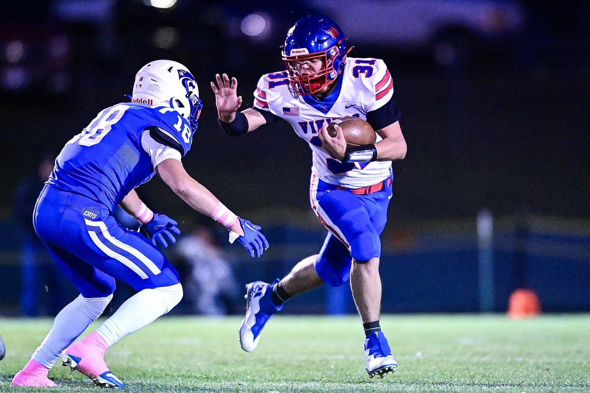 Bigfork running back Treker Hickey (31) looks for running room in the first quarter against Columbia Falls at Satterthwaite Field on Friday, Oct. 18. (Casey Kreider/Daily Inter Lake)