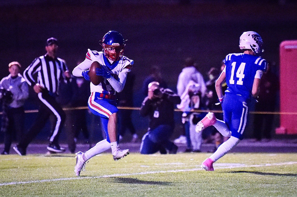 Bigfork defensive back Ollie Buzzell (17) intercepts a pass in the first quarter against Columbia Falls at Satterthwaite Field on Friday, Oct. 18. (Casey Kreider/Daily Inter Lake)