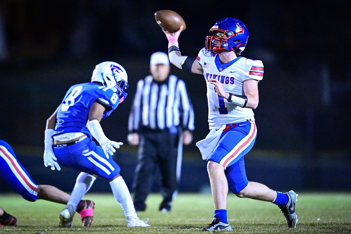 Bigfork quarterback Cole Schmit (1) throws in the first quarter against Columbia Falls at Satterthwaite Field on Friday, Oct. 18. (Casey Kreider/Daily Inter Lake)