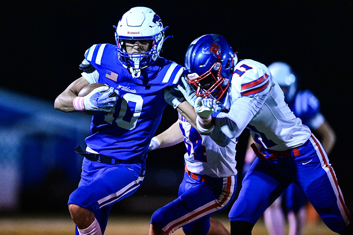 Columbia Falls wide receiver Easton Brooks (10) picks up yardage on a reception in the second quarter against Bigfork at Satterthwaite Field on Friday, Oct. 18. (Casey Kreider/Daily Inter Lake)