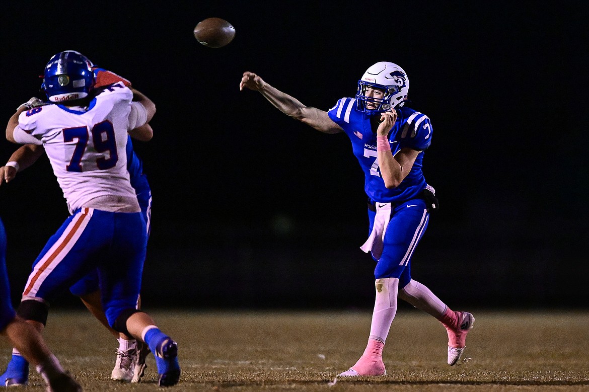 Columbia Falls quarterback Banyan Johnston (7) throws in the second quarter against Bigfork at Satterthwaite Field on Friday, Oct. 18. (Casey Kreider/Daily Inter Lake)