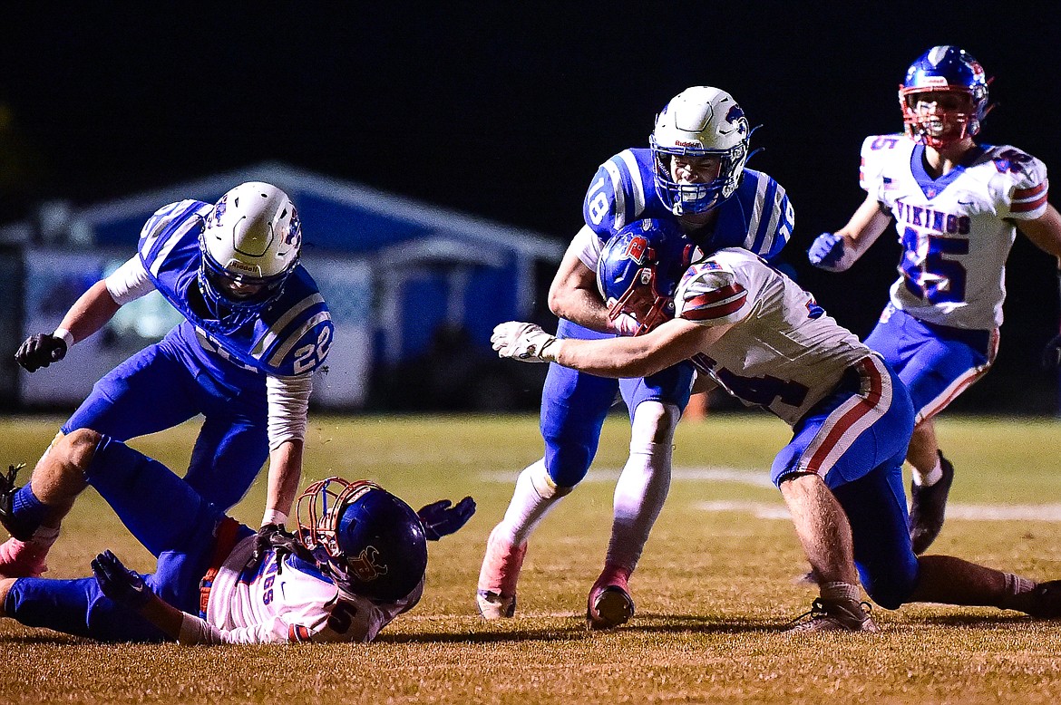 Columbia Falls wide receiver Jett Pitts (18) picks up yardage on a run in the second quarter against Bigfork at Satterthwaite Field on Friday, Oct. 18. (Casey Kreider/Daily Inter Lake)