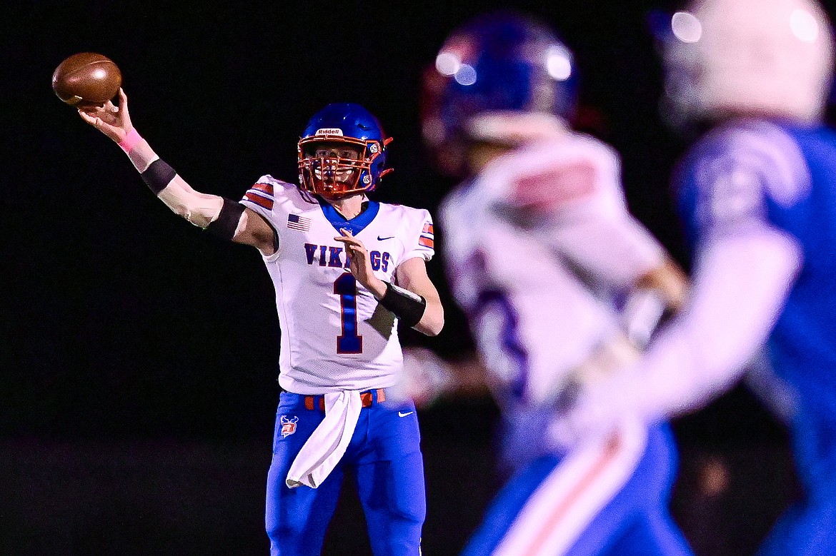 Bigfork quarterback Cole Schmit (1) drops back to pass in the third quarter against Columbia Falls at Satterthwaite Field on Friday, Oct. 18. (Casey Kreider/Daily Inter Lake)