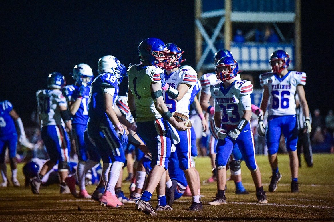 Bigfork quarterback Cole Schmit (1) celebrates with teammates after a touchdown run in the third quarter against Columbia Falls at Satterthwaite Field on Friday, Oct. 18. (Casey Kreider/Daily Inter Lake)