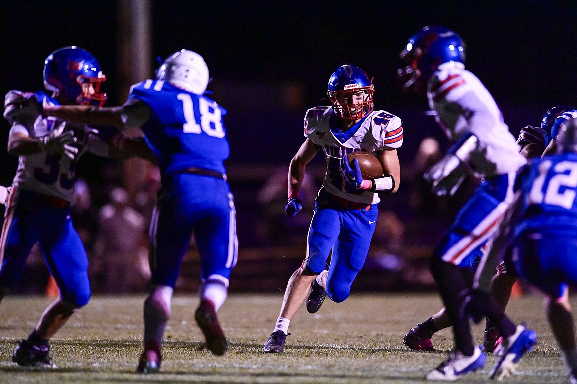 Bigfork running back Noah Pandina (45) looks for running room in the third quarter against Columbia Falls at Satterthwaite Field on Friday, Oct. 18. (Casey Kreider/Daily Inter Lake)