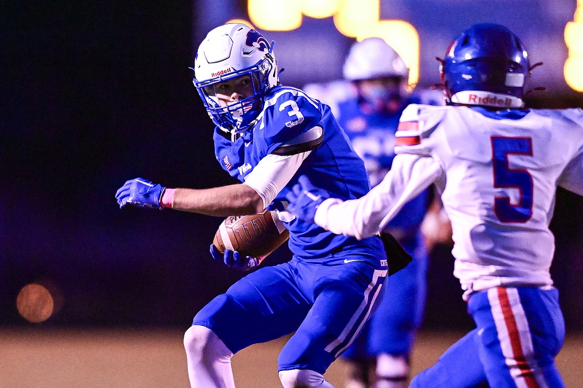 Columbia Falls wide receiver Cooper Ross (3) picks up yardage after a reception in the first quarter against Bigfork at Satterthwaite Field on Friday, Oct. 18. (Casey Kreider/Daily Inter Lake)