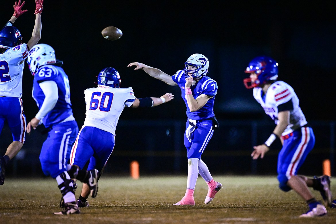 Columbia Falls quarterback Banyan Johnston (7) throws in the third quarter against Bigfork at Satterthwaite Field on Friday, Oct. 18. (Casey Kreider/Daily Inter Lake)