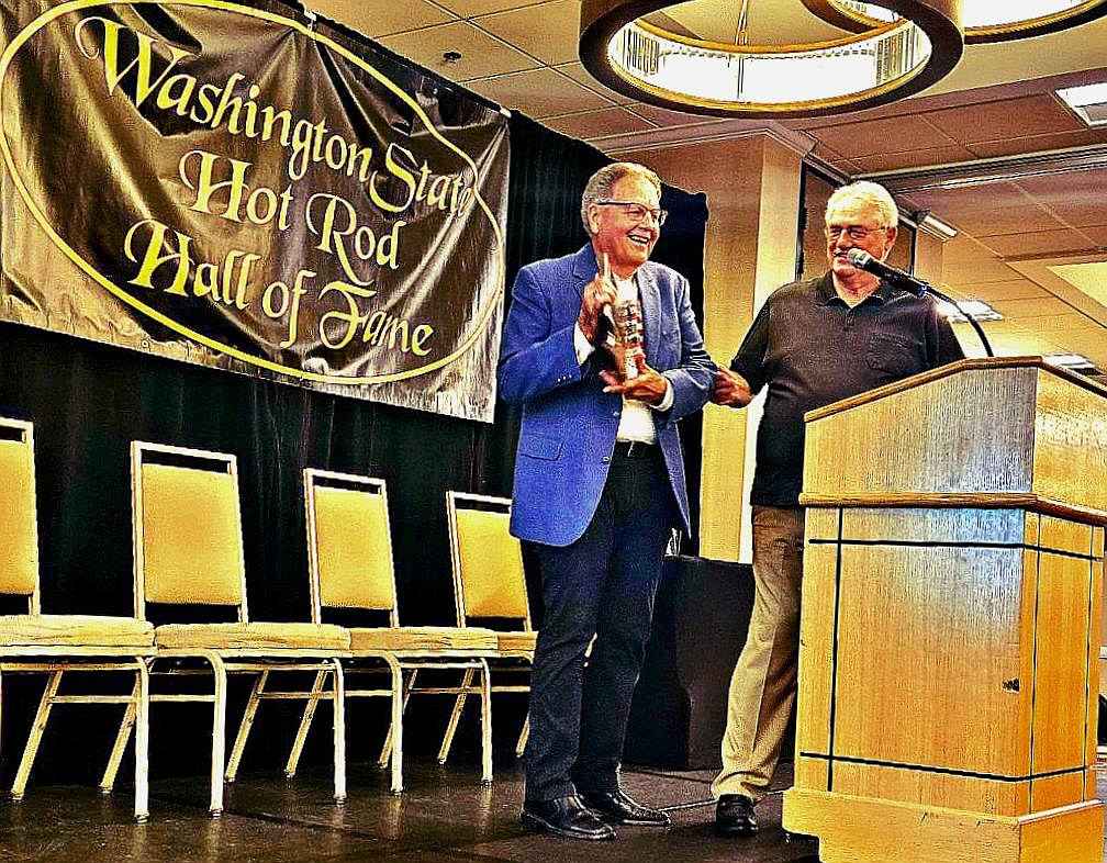 Outgoing club president Dave Robins accepts the 50-year award during the annual WSHR banquet.