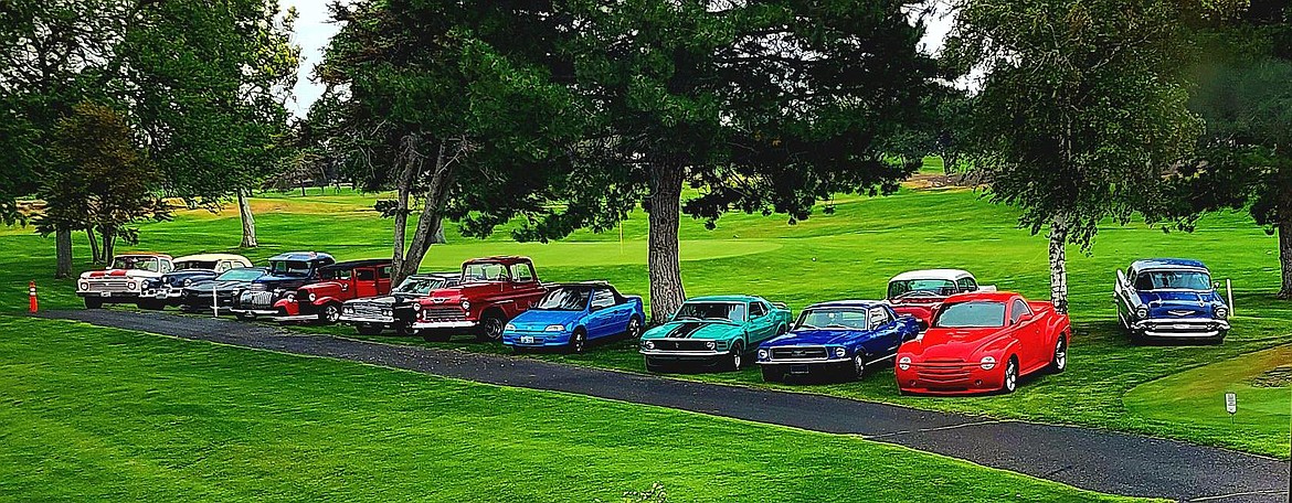 Cars from the Moses Lake Classic Car Club roll line up for a picture during the club’s cruise to the annual WSHR Hall of Fame banquet.