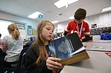 Elks members distribute dictionaries to Coeur d'Alene third graders