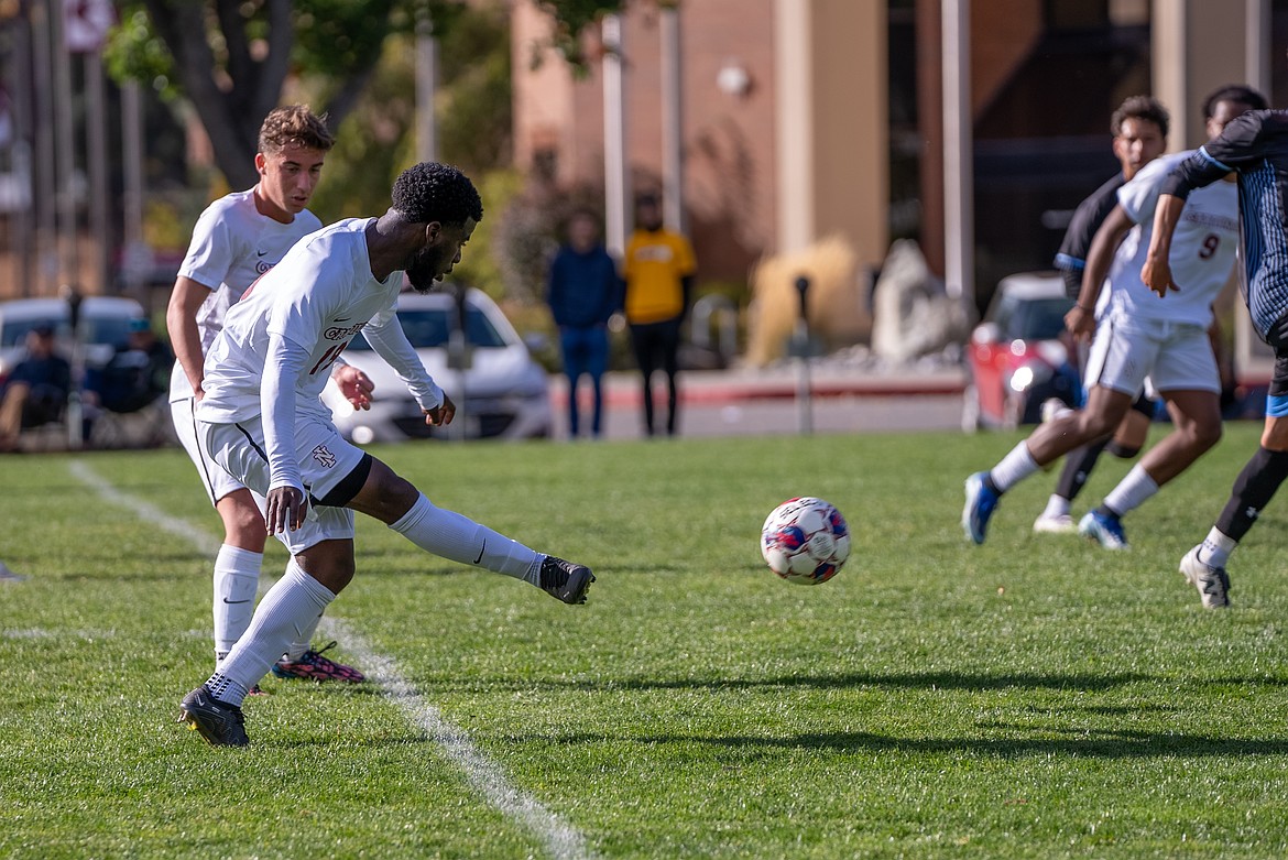 NIC ATHLETICS
North Idaho College freshman defender Richard Bollanga clears the ball during the first half of a Scenic West Athletic Conference match against Utah State-Eastern at Eisenwinter Field on Saturday.