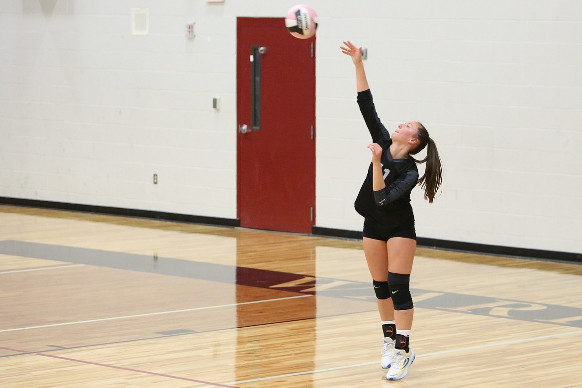 Almira/Coulee-Hartline sophomore Josie Bayless serves the ball during the second set of Thursday’s match against Valley Christian.