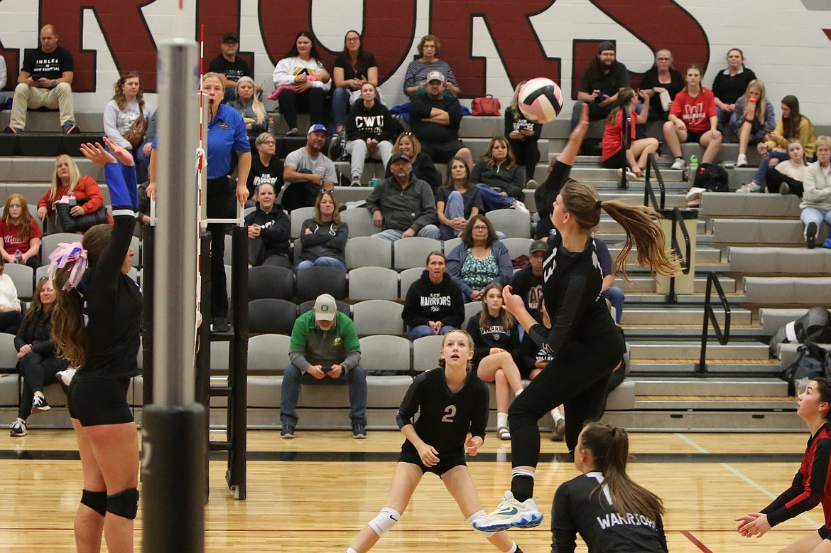 Almira/Coulee-Hartline junior Emma Brummett rises to spike the ball during the second set against Valley Christian on Thursday.