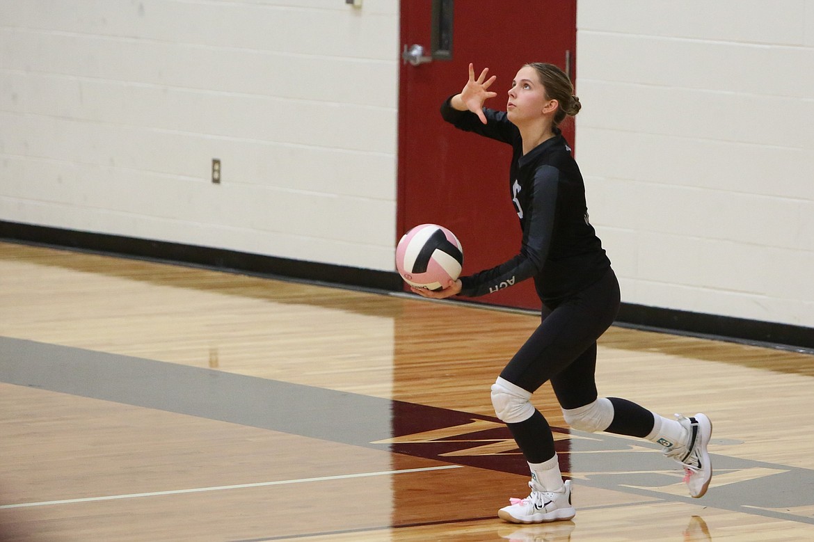 Almira/Coulee-Hartline sophomore Dani Isaak prepares to serve the ball against Valley Christian on Thursday.