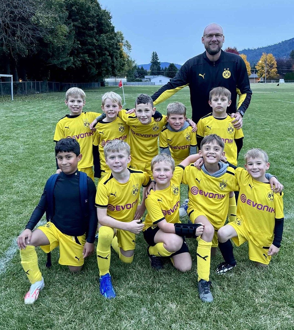 Courtesy photo
The BVBIA CDA Boys U09 Yellow soccer team defeated the WE SURF SC B17 Black 3-2 in a Friday evening match. In the front row from left are Jorge Rodriguez, Graham Brown, Lincoln Haynie, Onyx Barnes and Ryker Raber; and back row from left, Greyson Guy, Max Stover, Cole Rounds, Estes Hartley and Mitchell Volland; and rear, coach Jason Steenstra. In the second game, the BVBIA team defeated Sandpoint FC 2016B Red 5-3 on Saturday.