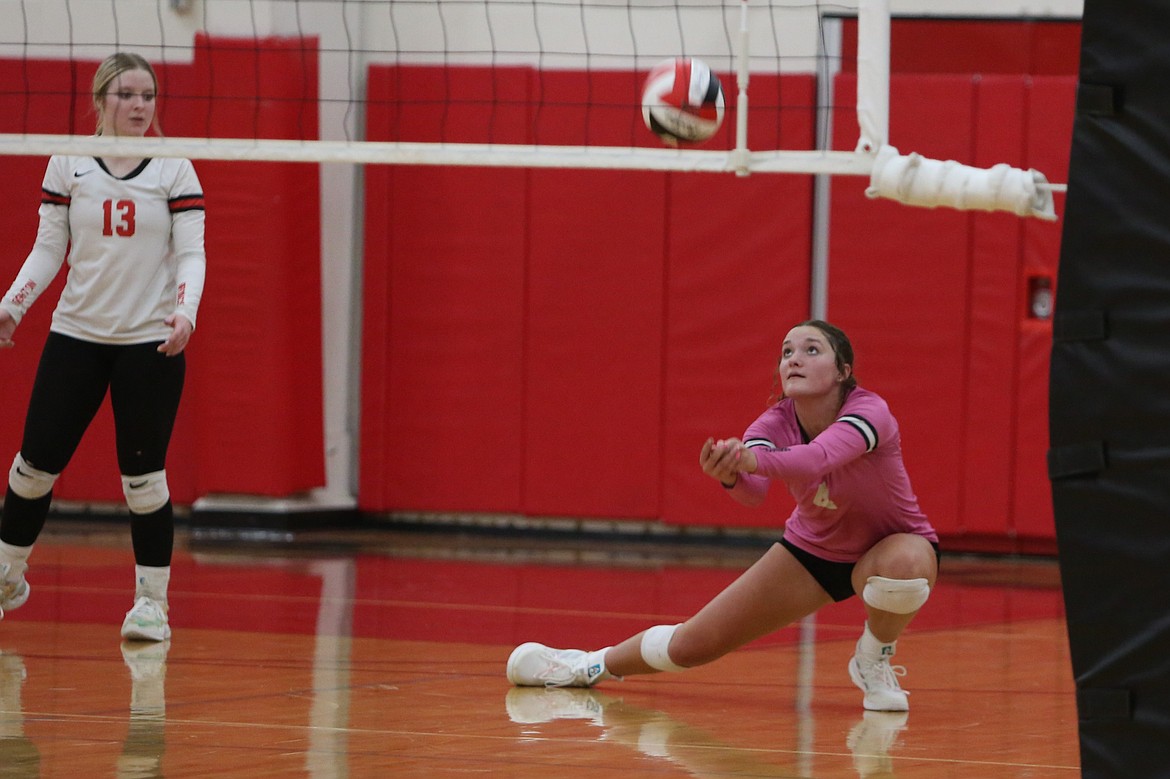 Lind-Ritzville/Sprague junior Saige Galbreath goes down to receive a serve from Manson during the third set.