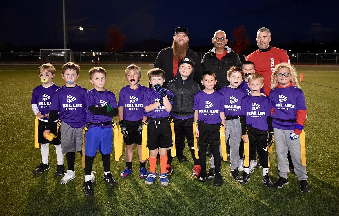 Courtesy photo
The Purple Panthers took third place in the flag football Cereal Bowl through Real Life Sports last Thursday, beating the Cougars 54-48 in the first and second grade division. Panthers touchdowns were scored by Calum Hughes, Cruz Gelz and Ryatt Maestas. In the front row from left are Calum Hughes, Hudson Adrian, Porter Horsley, Roman Shuck, Karsten Lakey, Degan Wright, Ryatt Maestas, Wyatt Adams, Cruz Gelz, Lawson Lamm and Conlin McIntosh; and back row from left, coaches Quin Shuck, Gene Marquez and Corey Adrian.