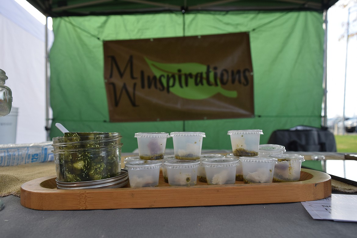 Samples of pesto with little chunks of bread sit at the MW Inspirations stand at the Moses Lake Farmers Market last Saturday.